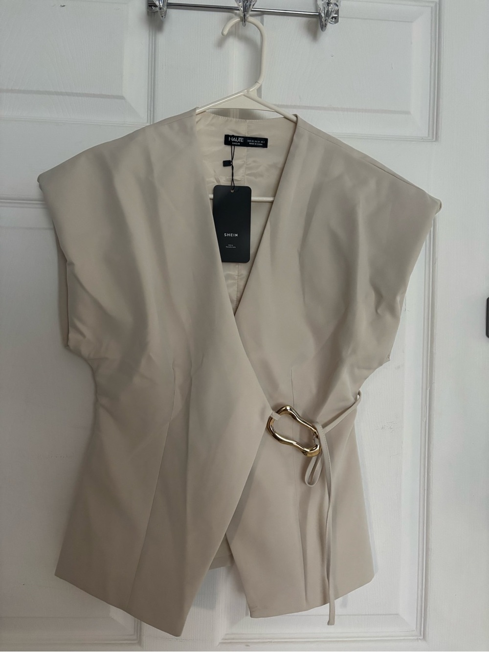 HAUTE SHORE Beige Wrap Top with Gold Buckle Accent